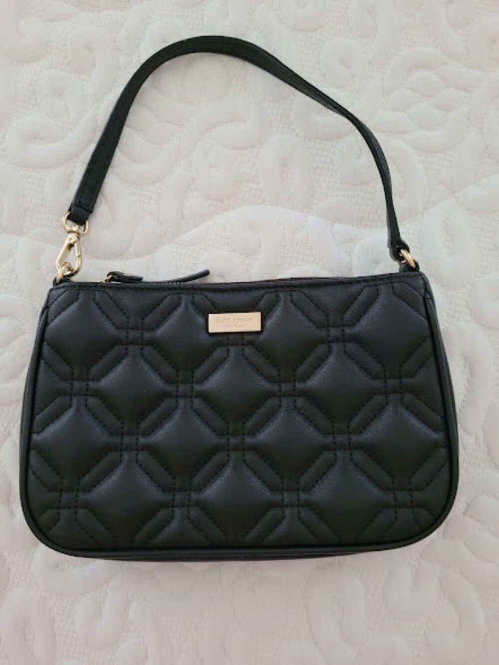 Kate Spade black quilted wristlet